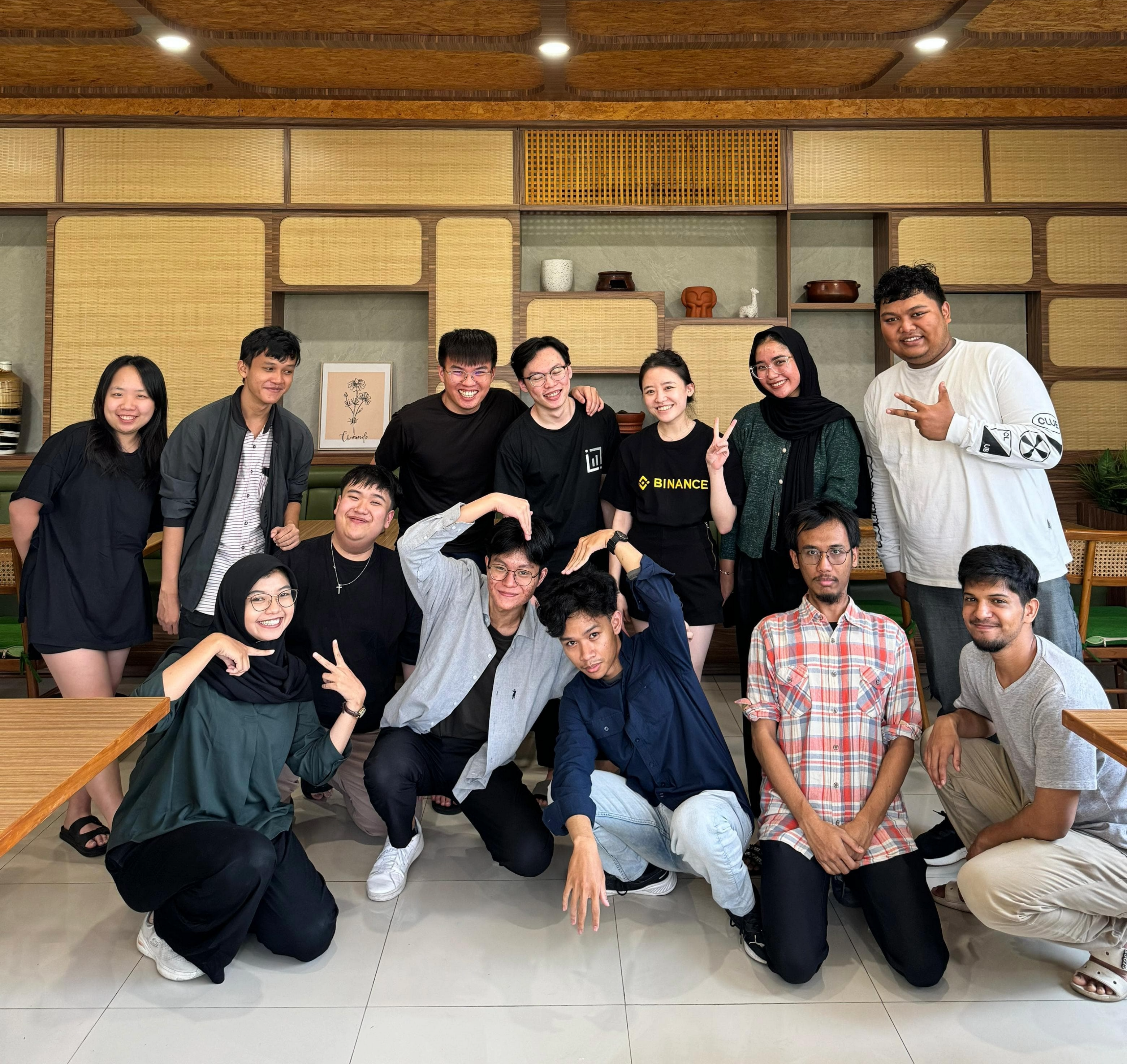 WidaTech team members posing together in the office