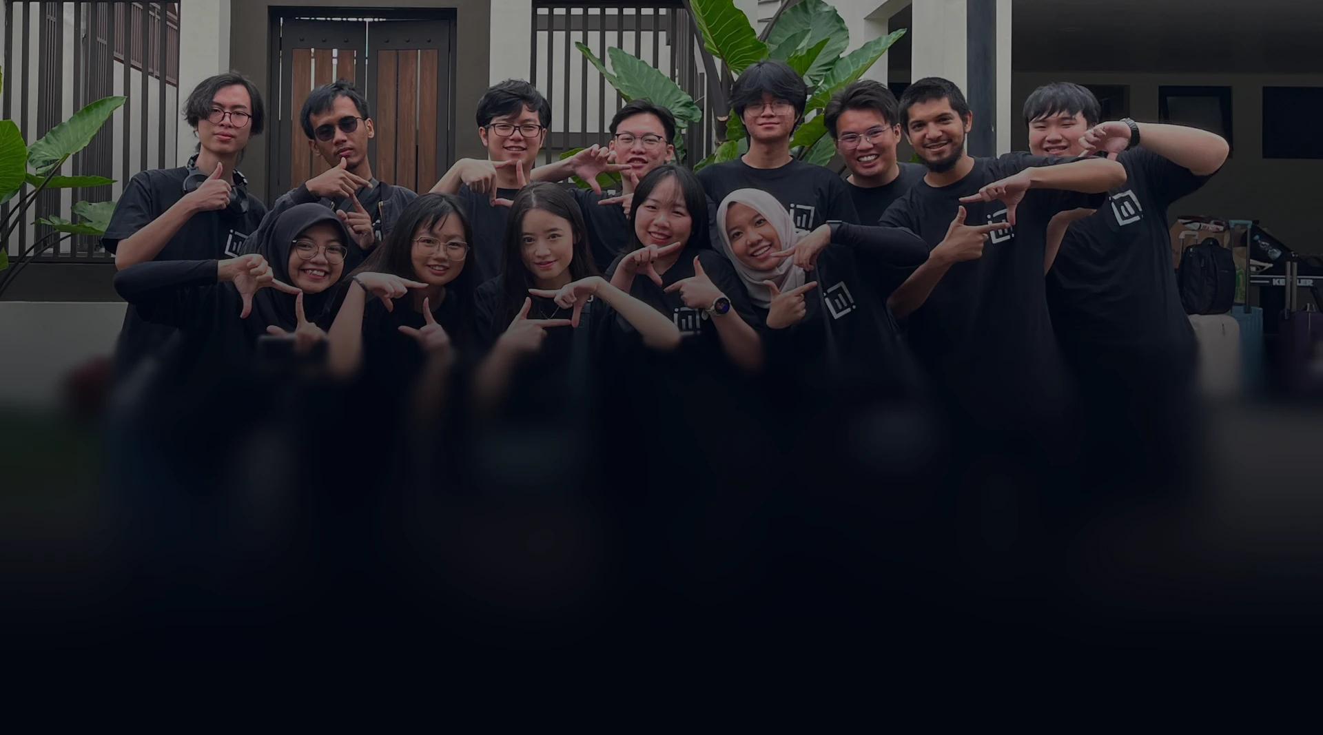 WidaTech team members posing together in the office
